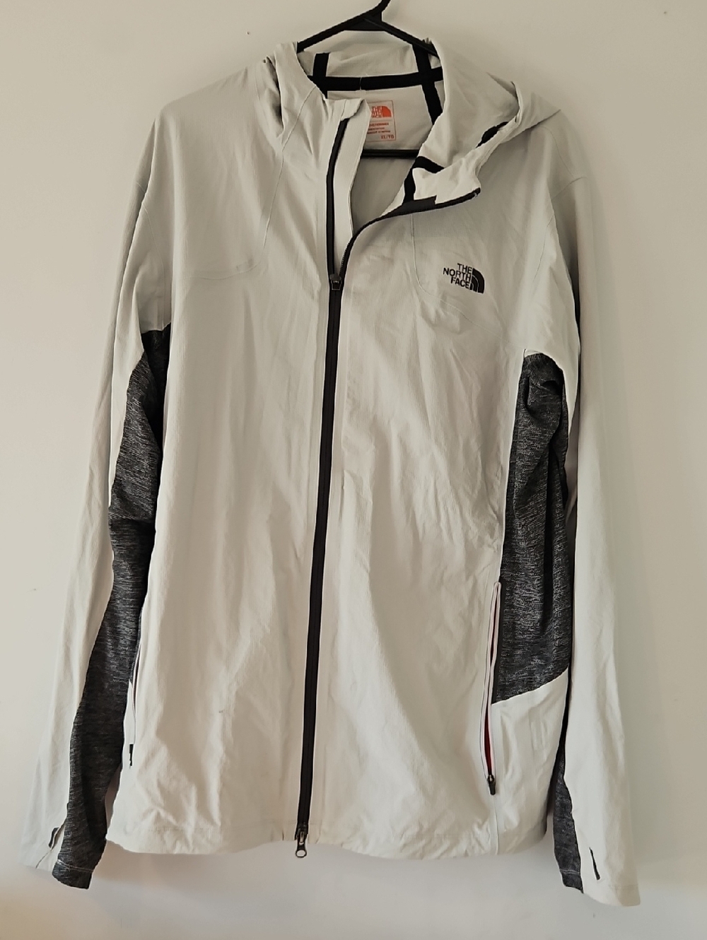 The North Face Men’s White Windbreaker with Dark Gray Sleeve Panels